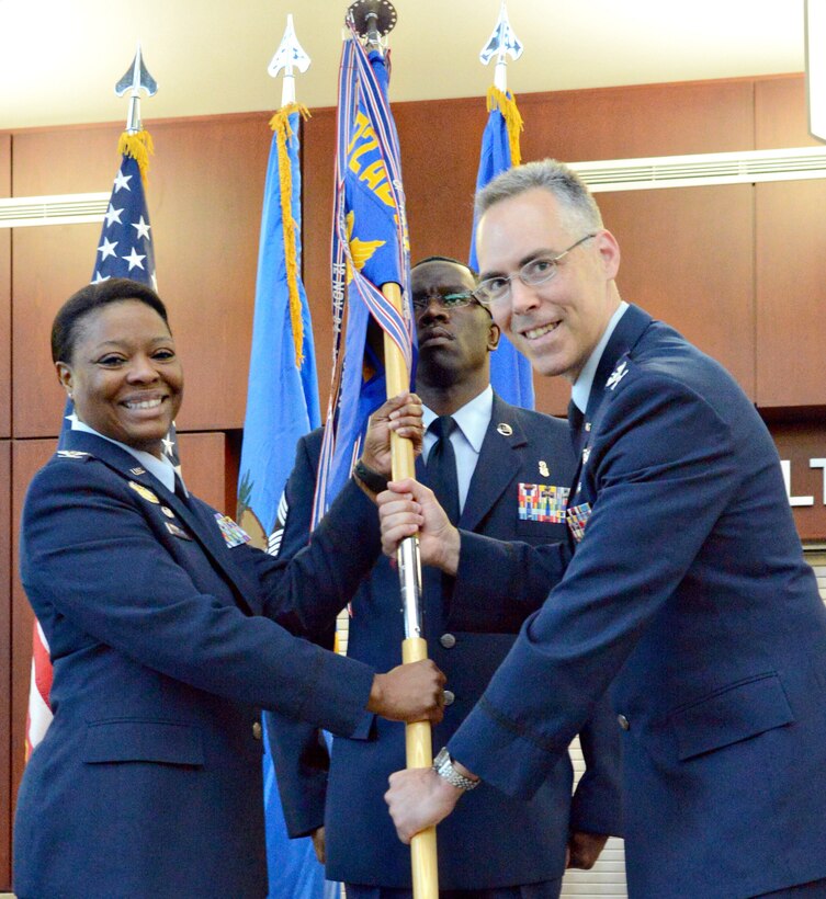 Col. Christopher M. Grussendorf assumed command of the 72nd Medical Group Aug. 17 during a ceremony inside the Tinker Clinic lobby. 72nd Air Base Wing Commander Col. Stephanie Wilson was the presiding officer of the ceremony and Chief Master Sgt. Paul Thomas, 72nd MDG superintendent, served as the guidon bearer. (Air Force photo by Kelly White)
