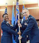 Col. Christopher M. Grussendorf assumed command of the 72nd Medical Group Aug. 17 during a ceremony inside the Tinker Clinic lobby. 72nd Air Base Wing Commander Col. Stephanie Wilson was the presiding officer of the ceremony and Chief Master Sgt. Paul Thomas, 72nd MDG superintendent, served as the guidon bearer. (Air Force photo by Kelly White)