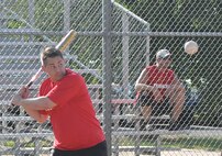 Thumper Chris “Monty” Montalbano keeps his eyes on the ball Aug. 11 in the doubleheader pitting the 507th ARW against the 513th ACG. The Okies blasted the Thumpers 23-6 at Champ Field before the Thumpers rallied for an 11-9 win during the second game. (Air Force photo by John Parker)
