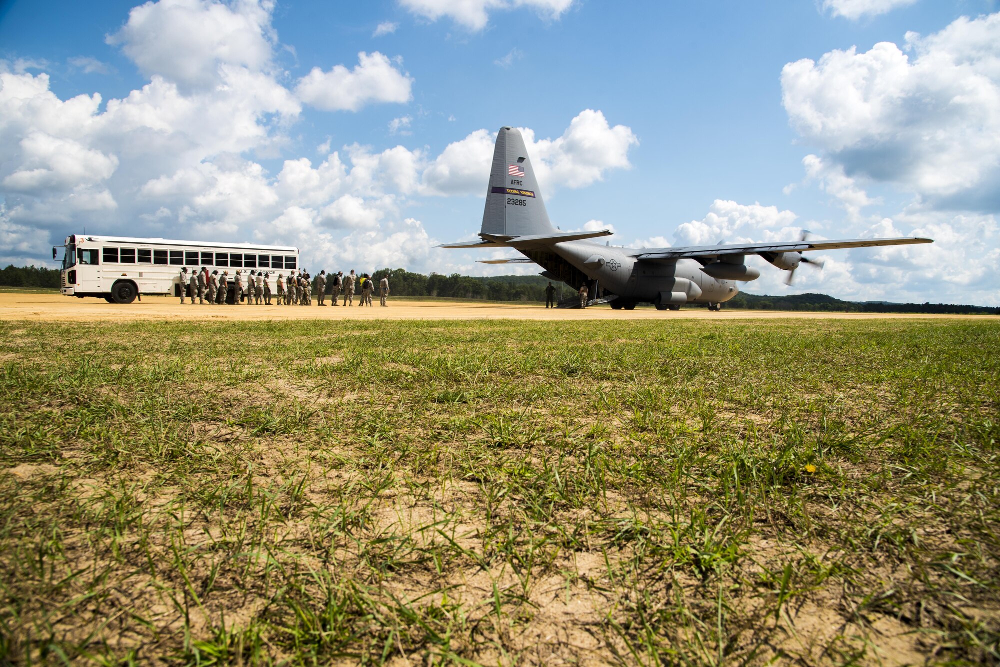 Aeromedical Evacuation crew prepare to load a C-130 Hercules with simulated patients during Patriot Warrior exercise August 16, 2016, at Fort McCoy, Wis. Patriot Warrior is the Air Force Reserve's premier contingency deployment training exercise, designed to demonstrate training ranging from bare base buildup to full operational capabilities. (U.S. Air Force photo by Staff Sgt. Adam C. Borgman)