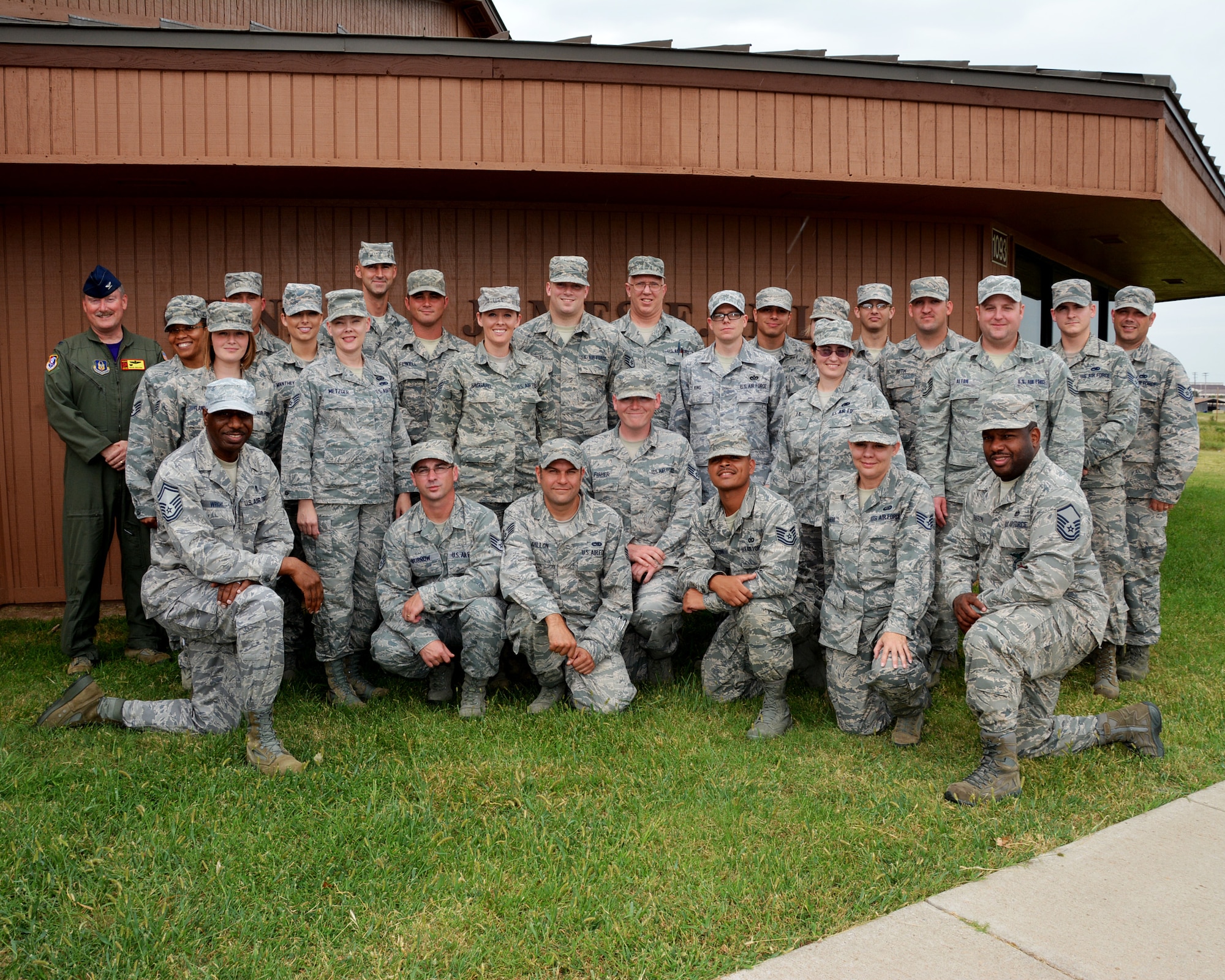 Enlisted leaders from the 507th Air Refueling Wing and other units in the Air Force Reserve Command, along with 507th Air Refueling Wing commander Col. Doug Gullion, pose for a graduation photo upon completion of the NCO Leadership Development Course Aug. 12, 2016, at the Hill Conference Center at Tinker Air Force Base, Okla. Twenty-five students attended the week-long course, designed to teach them leadership skills for tough subjects in the workplace. 