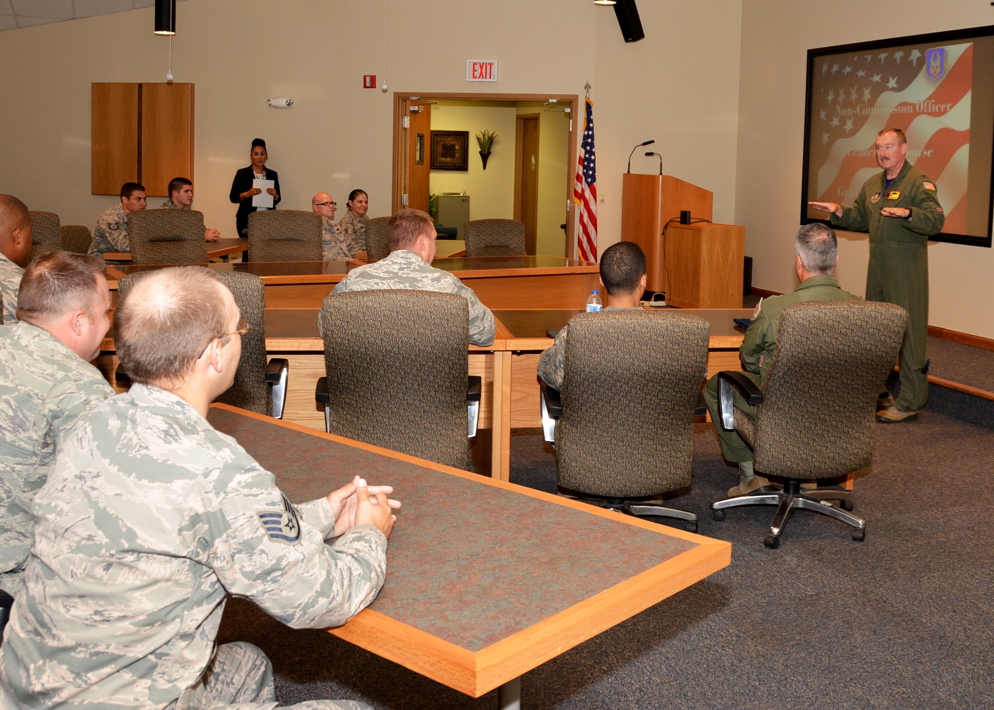 Col. Doug Gullion, 507th Air Refueling Wing commander, speaks to the enlisted leaders upon their graduation from NCO Leadership Development Course Aug. 12, 2016, at the Hill Conference Center at Tinker Air Force Base, Okla. Twenty-five students attended the week-long course, designed to teach them leadership skills for tough subjects in the workplace. 