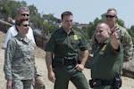 Gen. Lori Robinson, NORAD and USNORTHCOM Commander, inspects the Southwest Border between San Diego, Calif. and Tijuana, Mexico with the U.S. Customs and Border Protection Aug. 24, 2016.