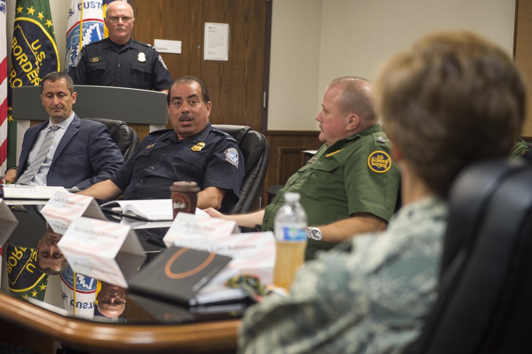 Gen. Lori Robinson (back center), NORAD and USNORTHCOM Commander, is briefed about the Southwest Border Region by members of the Department of Homeland Security, the U.S. Customs and Border Protection and Joint Task Force North at the CBP Air and Marine Operations in San Diego, Calif., Aug. 24, 2016. (NORAD and USNORTHCOM Courtesy Photo) 