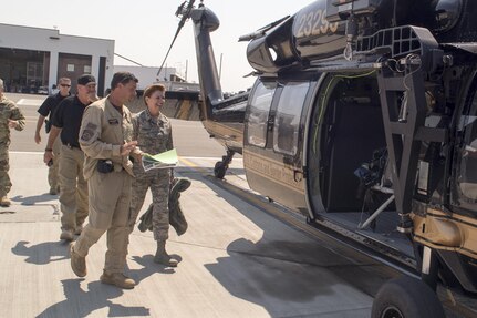 Gen. Lori Robinson, NORAD and USNORTHCOM Commander, prepares for a tour of the Southwest Border Region via helicopter with the U.S. Customs and Border Protection at the CBP Air and Marine Operations in San Diego, Calif., Aug. 24, 2016. 