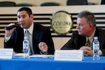 NSWC Corona Division Command Contracts Manager Sean Foley, left, and Contracting Officer Charles Sam Rainwater participate in "Doing Business with the Government" program at Corona City Hall.  Event organized as panel discussion to give small business owners insight into specific procurement procedures of City of Corona and other local government agencies. 