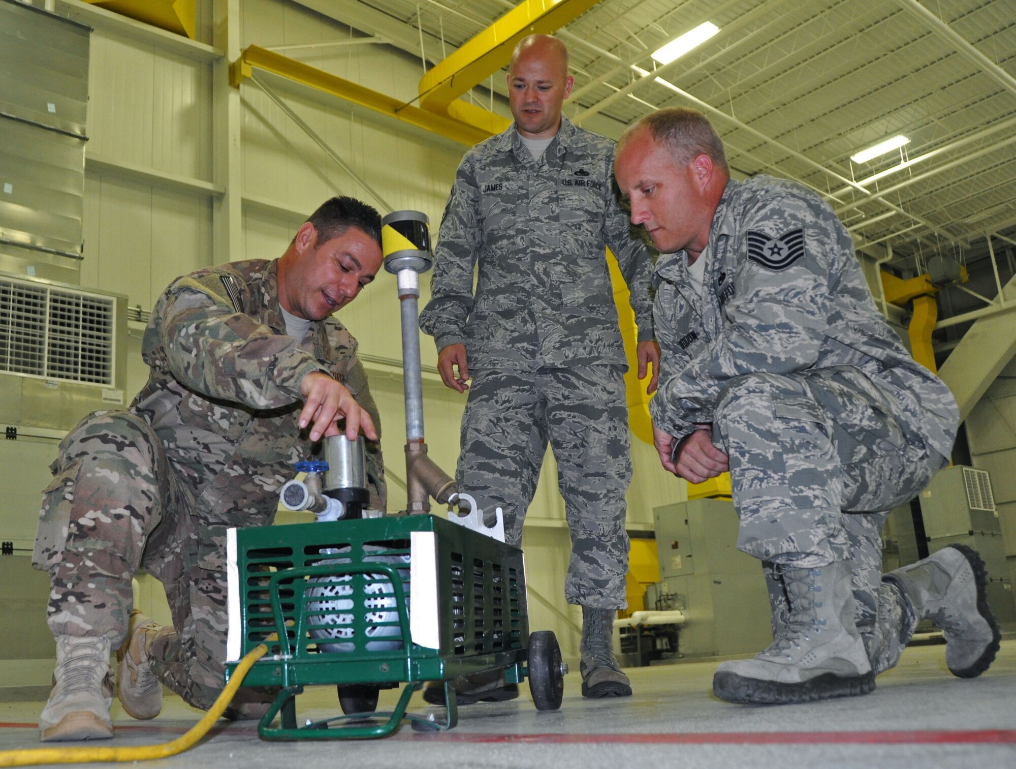 Master Sgt. David Dean, 919th Special Operations Maintenance Squadron, demonstrates features on a respiratory ventilation system to Senior Master Sgt. Trevor James, Air Force Special Operations Command Logistics Directorate superintendent, while Tech. Sgt. Bill Beddow, 919th SOMXS,  assists during a Site Activation Task Force Visit to Duke Field, Fla. Aug. 26, 2016. More than 100 functional experts from Air Force Special Operations Command, Air Force Reserve Command, 96th Test Wing (Eglin Air Force Base, Fla.) and 27th Special Operations Wing (Cannon AFB, N.M.) visited Duke Field Aug. 22-26, 2016 to study the impact of changes being made to the Non-Standard Aviation mission here. (U.S. Air Force photo/Dan Neely)