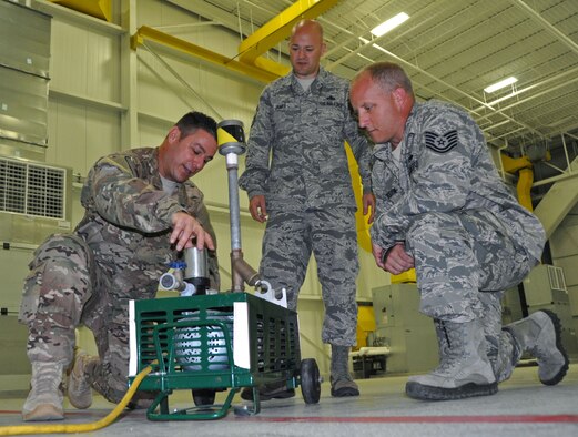 Master Sgt. David Dean, 919th Special Operations Maintenance Squadron, demonstrates features on a respiratory ventilation system to Senior Master Sgt. Trevor James, Air Force Special Operations Command Logistics Directorate superintendent, while Tech. Sgt. Bill Beddow, 919th SOMXS,  assists during a Site Activation Task Force Visit to Duke Field, Fla. Aug. 26, 2016. More than 100 functional experts from Air Force Special Operations Command, Air Force Reserve Command, 96th Test Wing (Eglin Air Force Base, Fla.) and 27th Special Operations Wing (Cannon AFB, N.M.) visited Duke Field Aug. 22-26, 2016 to study the impact of changes being made to the Non-Standard Aviation mission here. (U.S. Air Force photo/Dan Neely)