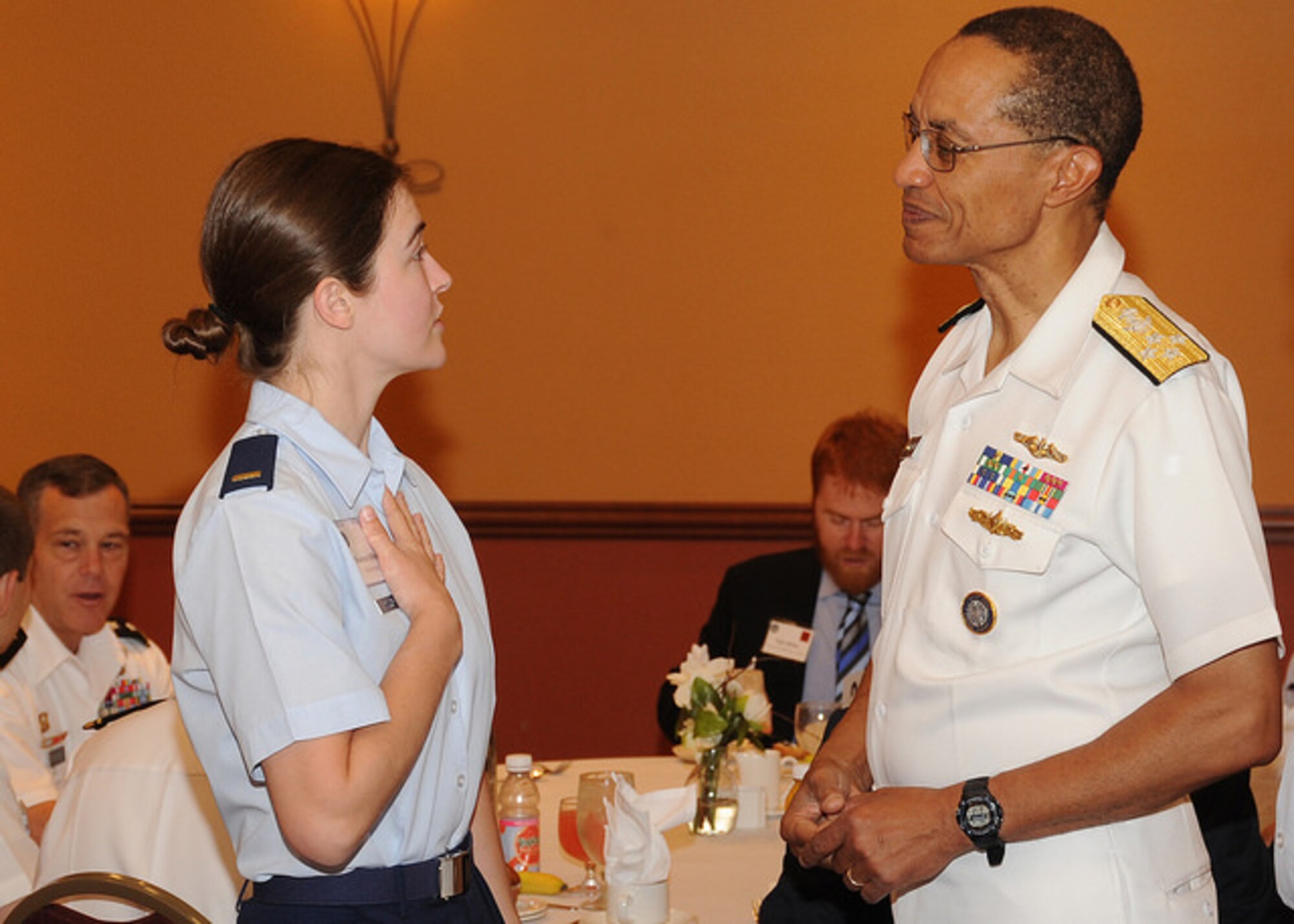 U.S. Navy Adm. Cecil D Haney, U.S. Strategic Command (USSTRATCOM) commander, speaks with 2nd Lt. Shannon Miller, an intelligence officer with the 157th Air Operations Group, Missouri Air National Guard at the “Next Generation Breakfast” during the seventh annual USSTRATCOM Deterrence Symposium, La Vista, Neb., July 28, 2016. The breakfast served as an opportunity for senior leaders to mentor junior personnel within the nuclear enterprise. (DoD photo by Steve Cunningham/Released)