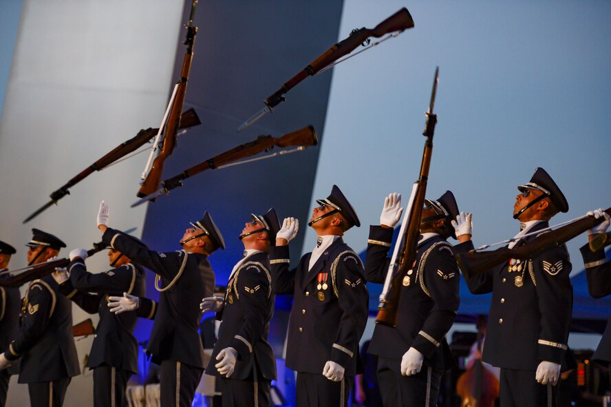 The U.S. Air Force Honor Guard Drill Team performs during a public U.S. Air Force Band concert at the Air Force Memorial to honor Vietnam War veterans Aug. 26, 2016, in Arlington, Va. Prior to attending the concert, Air Force Undersecretary Lisa S. Disbrow and Chief of Staff Gen. Dave Goldfein welcomed Gen. Stephen W. Wilson as the service's new vice chief of staff at a reception in the Fort Myer Officer's Club. (U.S. Air Force photo/Tech. Sgt. Joshua L. DeMotts)