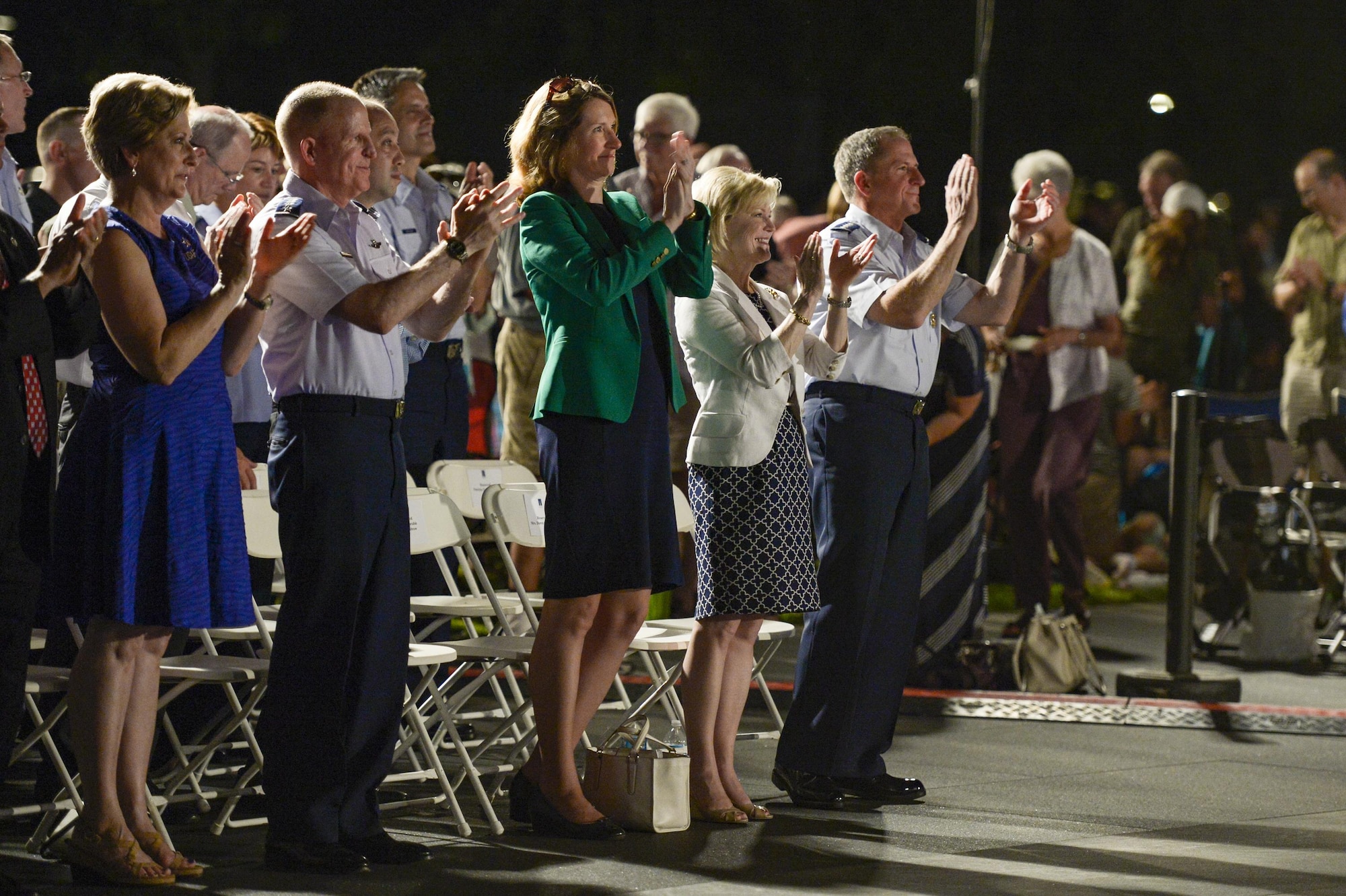 Nancy Wilson, Vice Chief of Staff Gen. Stephen W. Wilson, Air Force Undersecretary Lisa S. Disbrow, Dawn Goldfein and Chief of Staff Gen. Dave Goldfein applaud the U.S. Air Force Band’s performance held at the Air Force Memorial to honor Vietnam War veterans Aug. 26, 2016, in Arlington, Va. Prior to attending the concert, Disbrow and Goldfein welcomed Wilson as the service's new vice chief of staff at a reception in the Fort Myer Officer's Club. (U.S. Air Force photo/Tech. Sgt. Joshua L. DeMotts)