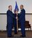 Maj. Gen. Richard Scobee, 10th Air Force commander, passes the 960th Cyberspace Operations Group flag to Col. Anthony Perkins during a change of command ceremony held Aug. 27 at the Inter-American Air Forces Academy at Joint Base San Antonio-Lackland, Texas. Perkins said his focus coming into this position is to "listen, learn and lead." (U.S. Air Force photo by Maj. Alysia R. Harvey) 