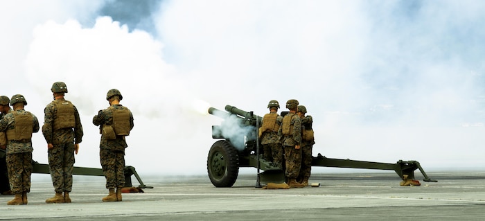 U.S. Marines with 1st Battalion, 12th Marine Regiment, render honors to Adm. Harry Harris with a 17 round salute during the U.S. Marine Corps Forces, Pacific change of command at Marine Corps Base Hawaii, Aug. 26, 2016. The change of command ceremony represents the transfer of responsibility and authority over MARFORPAC between commanders. 