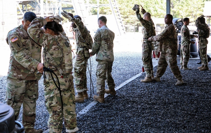 FORT JACKSON, S.C. – Non-commissioned officers of the 1st Battalion 34th Infantry Regiment ensure that the Soldiers of Foxtrot Company have properly tied their Swiss Seat rappelling knot before they go down Victory Tower on Aug 23, 2016.  Foxtrot Company currently has drill sergeants from both active duty and the reserve conducting training at Fort Jackson, S.C.  (U.S. Army Reserve photo by Sgt. Michael Adetula, 206th Broadcast Operations Detachment)