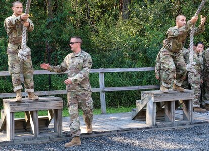 FORT JACKSON, S.C. – Army Reserve Drill Sergeant Larry Davis of Greenville S.C., instructs Soldiers as they attempt to complete the rope swing at the Victory Tower complex on Fort Jackson, S.C., during the Foxtrot Company training on Aug. 24, 2016. (U.S. Army Reserve photo by Sgt. Michael Adetula, 206th Broadcast Operations Detachment)