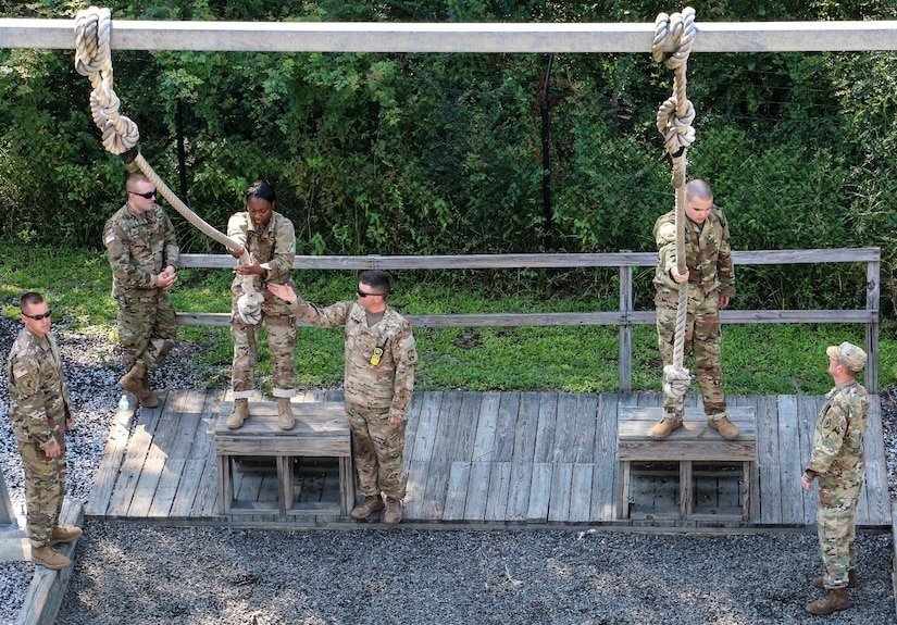 FORT JACKSON, S.C. – Reserve drill sergeants of the 1st Battalion 518th Regiment, 2nd Brigade, 98th Training Division coach basic combat training Soldiers on how to complete the rope jump obstacle at the Victory Tower complex on Aug. 23, 2016.  The reserve drill sergeants are on Fort Jackson in support of the Foxtrot Company mission which uses reserve and active duty drill sergeants to train new privates. (U.S. Army Reserve photo by Sgt. Michael Adetula, 206th Broadcast Operations Detachment)