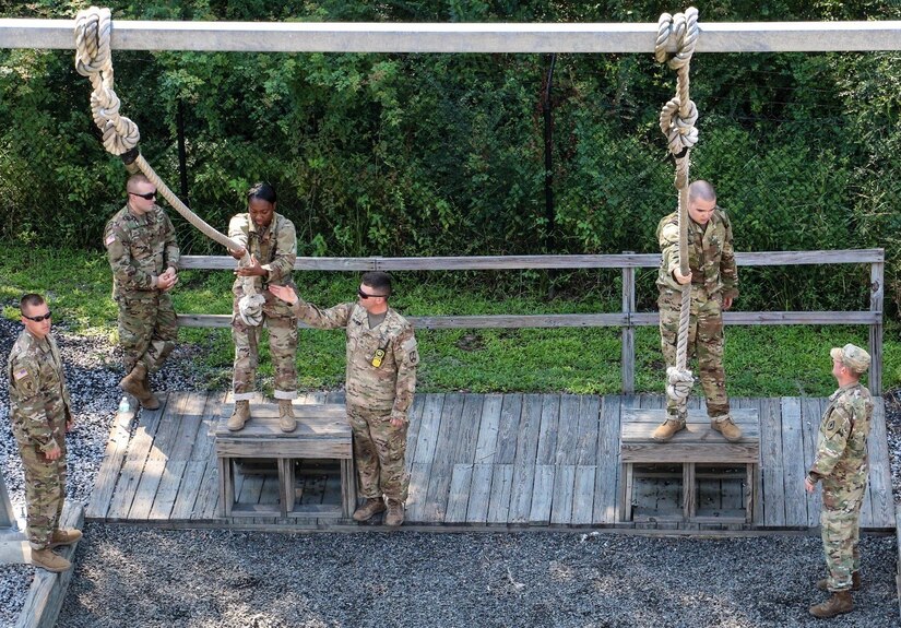 FORT JACKSON, S.C. – Reserve drill sergeants of the 1st Battalion 518th Regiment, 2nd Brigade, 98th Training Division coach basic combat training Soldiers on how to complete the rope jump obstacle at the Victory Tower complex on Aug. 23, 2016.  The reserve drill sergeants are on Fort Jackson in support of the Foxtrot Company mission which uses reserve and active duty drill sergeants to train new privates. (U.S. Army Reserve photo by Sgt. Michael Adetula, 206th Broadcast Operations Detachment)