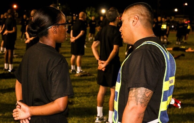 FORT JACKSON, S.C. – Sgt Nicolas Honorato, of the 95th Training Division, instructs a private during physical training on Aug. 22, 2016 at Fort Jackson, S.C.  Sgt. Honorato is a reserve drill sergeant supporting the Foxtrot Company Mission as a drill sergeant as part of his annual training. (U.S. Army Reserve photo by Sgt. Michael Adetula, 206th Broadcast Operations Detachment)