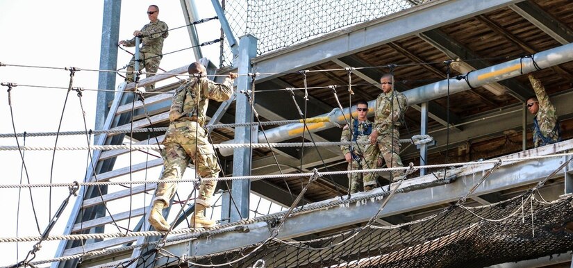 FORT JACKSON, S.C. – Soldiers of Foxtrot Company, 1st Battalion 34th Infantry Regiment conduct the rope bridge obstacles at the Victory Tower complex on Aug. 23, 2016.  Foxtrot Company has a unique mission in the Army, it uses both active duty and reserve drill sergeants to train Soldiers going through Basic Combat Training on Fort Jackson, S.C. (U.S. Army Reserve photo by Sgt. Michael Adetula, 206th Broadcast Operations Detachment)
