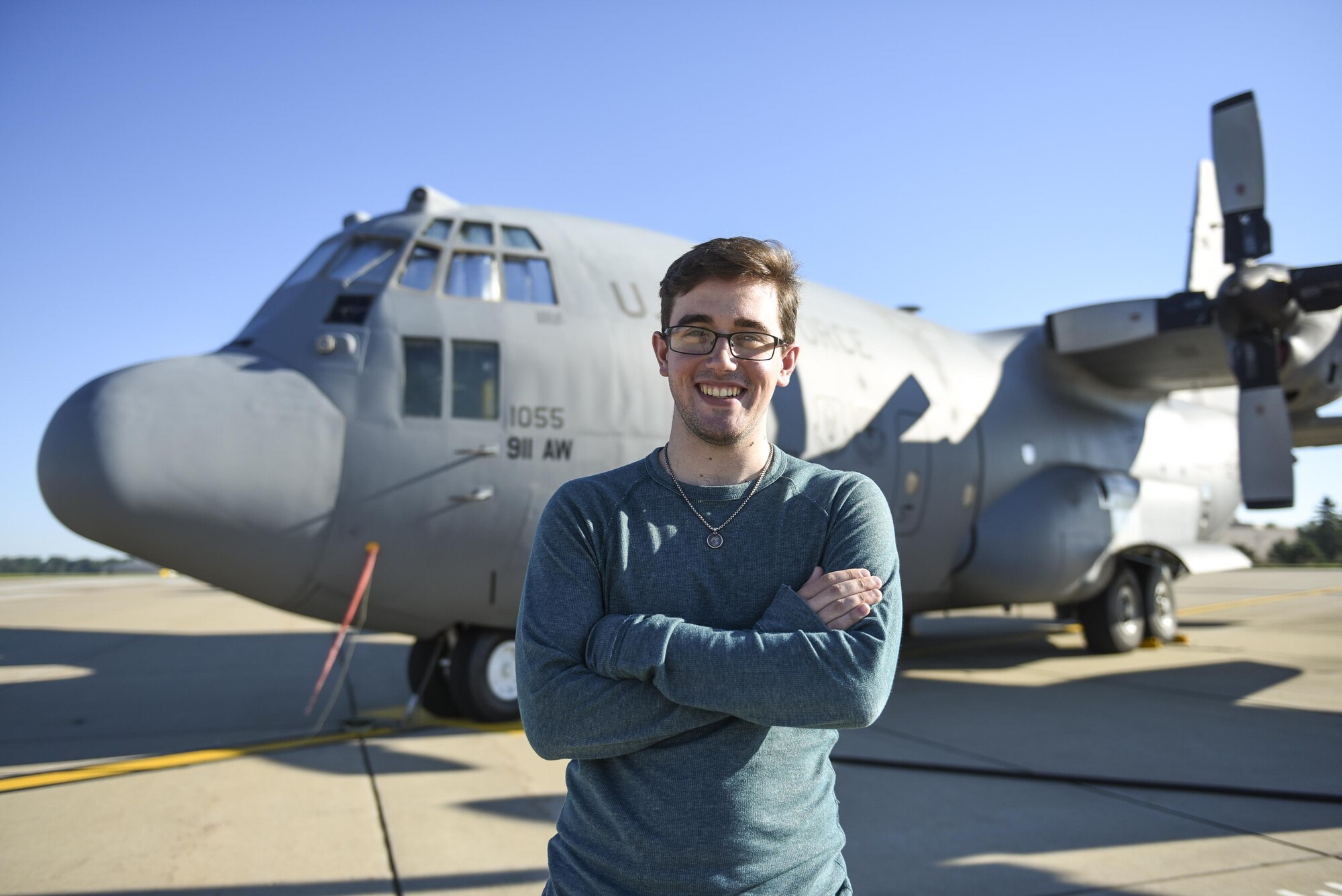 Garrett Cilli, student hire with the 911th Airlift Wing, poses in front of a C-130 Hercules at the Pittsburgh International Airport Air Reserve Station, August 23, 2016. Cilli is a sophomore at Washington and Jefferson College, where he is a history and education double major with a pre-law focus. (U.S. Air Force Photo by Airman 1st Class Bethany Kobily)