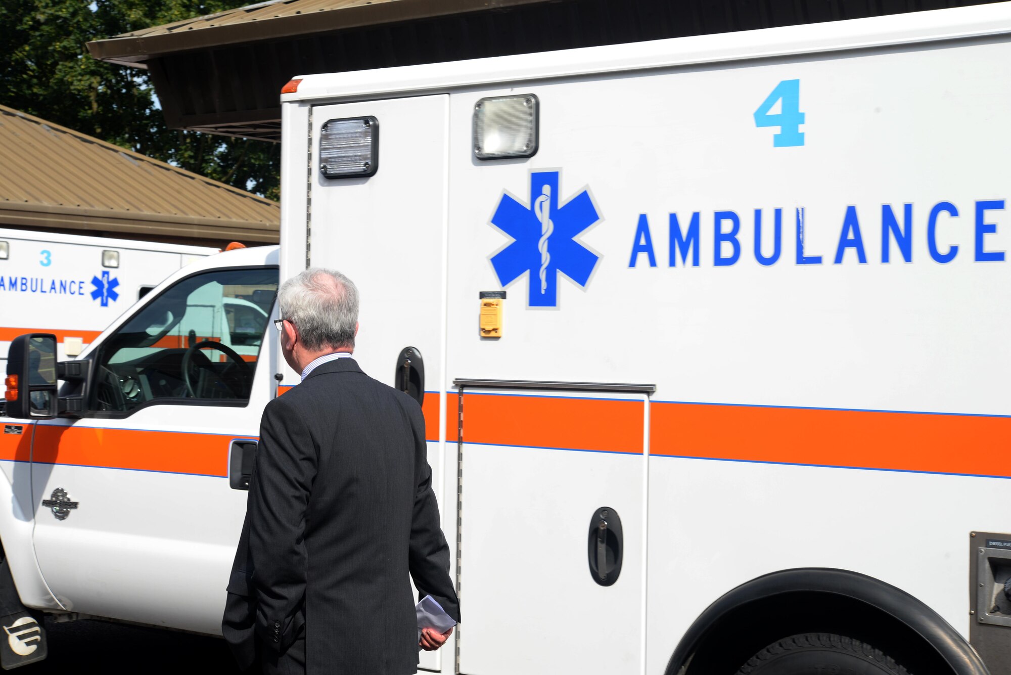 Sir Keith Pearson, the National Health Service’s chairman of Health Education England, examines a 48th Medical Operations Squadron ambulance at Royal Air Force Lakenheath, England, Aug. 25, 2016. Pearson visited the emergency room and the simulation center to see where Liberty Medics provide care and how they train for worst-case scenarios. (U.S. Air Force photo/Airman 1st Class Eli Chevalier) 