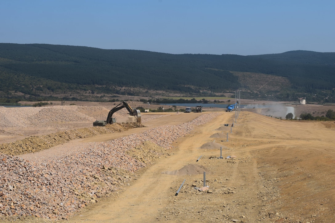 Soldiers with the 194th Engineer Brigade, Tennessee Army National Guard work with Airmen from the 118th Mission Support Group to erect lights and install lightning protection systems on an ammunition holding area during Operation Resolute Castle on August 20, 2016 at Novo Selo Training Area, Bulgaria.  Operation Resolute Castle, a wide-scale military construction operation through Eastern Europe, spans across Estonia, Hungary, Romania, and Bulgaria, and involves units from the U.S. Army, U.S. Army Reserve, Tennessee Army and Air National Guard, Mississippi National Guard, and Alabama Army National Guard.  (U.S. Army Photo by 1st Lt. Matthew Gilbert, 194th Engineer Brigade, Tennessee Army National Guard)