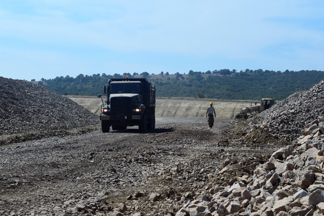 Soldiers with the 194th Engineer Brigade, Tennessee Army National Guard work with Airmen from the 118th Mission Support Group to finish construction of an ammunition holding area during Operation Resolute Castle on August 20, 2016 at Novo Selo Training Area, Bulgaria.  Operation Resolute Castle, a wide-scale military construction operation through Eastern Europe, spans across Estonia, Hungary, Romania, and Bulgaria, and involves units from the U.S. Army, U.S. Army Reserve, Tennessee Army and Air National Guard, Mississippi National Guard, and Alabama Army National Guard.  (U.S. Army Photo by 1st Lt. Matthew Gilbert, 194th Engineer Brigade, Tennessee Army National Guard)