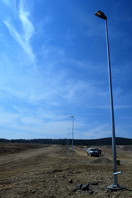 Soldiers with the 194th Engineer Brigade, Tennessee Army National Guard work with Airmen from the 118th Mission Support Group to erect lights and install lightning protection systems on an ammunition holding area during Operation Resolute Castle on August 20, 2016 at Novo Selo Training Area, Bulgaria.  Operation Resolute Castle, a wide-scale military construction operation through Eastern Europe, spans across Estonia, Hungary, Romania, and Bulgaria, and involves units from the U.S. Army, U.S. Army Reserve, Tennessee Army and Air National Guard, Mississippi National Guard, and Alabama Army National Guard.  (U.S. Army Photo by 1st Lt. Matthew Gilbert, 194th Engineer Brigade, Tennessee Army National Guard)