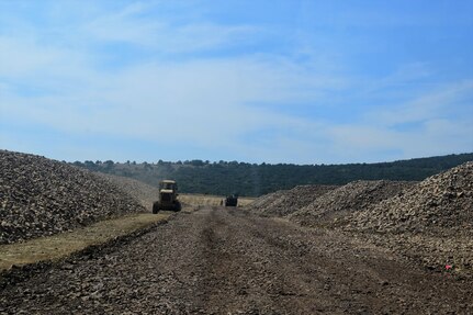 Soldiers with the 194th Engineer Brigade, Tennessee Army National Guard work with Airmen from the 118th Mission Support Group to finish construction of an ammunition holding area during Operation Resolute Castle on August 20, 2016 at Novo Selo Training Area, Bulgaria.  Operation Resolute Castle, a wide-scale military construction operation through Eastern Europe, spans across Estonia, Hungary, Romania, and Bulgaria, and involves units from the U.S. Army, U.S. Army Reserve, Tennessee Army and Air National Guard, Mississippi National Guard, and Alabama Army National Guard.  (U.S. Army Photo by 1st Lt. Matthew Gilbert, 194th Engineer Brigade, Tennessee Army National Guard)