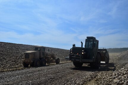 Soldiers with the 194th Engineer Brigade, Tennessee Army National Guard work with Airmen from the 118th Mission Support Group to finish construction of an ammunition holding area during Operation Resolute Castle on August 20, 2016 at Novo Selo Training Area, Bulgaria.  Operation Resolute Castle, a wide-scale military construction operation through Eastern Europe, spans across Estonia, Hungary, Romania, and Bulgaria, and involves units from the U.S. Army, U.S. Army Reserve, Tennessee Army and Air National Guard, Mississippi National Guard, and Alabama Army National Guard.  (U.S. Army Photo by 1st Lt. Matthew Gilbert, 194th Engineer Brigade, Tennessee Army National Guard)