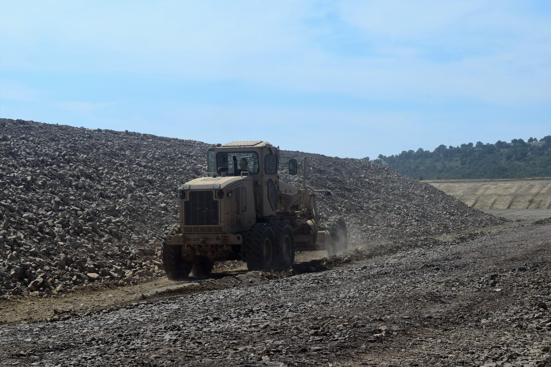 Soldiers with the 194th Engineer Brigade, Tennessee Army National Guard work with Airmen from the 118th Mission Support Group to finish construction of an ammunition holding area during Operation Resolute Castle on August 20, 2016 at Novo Selo Training Area, Bulgaria.  Operation Resolute Castle, a wide-scale military construction operation through Eastern Europe, spans across Estonia, Hungary, Romania, and Bulgaria, and involves units from the U.S. Army, U.S. Army Reserve, Tennessee Army and Air National Guard, Mississippi National Guard, and Alabama Army National Guard.  (U.S. Army Photo by 1st Lt. Matthew Gilbert, 194th Engineer Brigade, Tennessee Army National Guard)