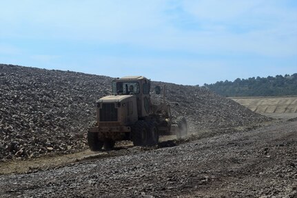 Soldiers with the 194th Engineer Brigade, Tennessee Army National Guard work with Airmen from the 118th Mission Support Group to finish construction of an ammunition holding area during Operation Resolute Castle on August 20, 2016 at Novo Selo Training Area, Bulgaria.  Operation Resolute Castle, a wide-scale military construction operation through Eastern Europe, spans across Estonia, Hungary, Romania, and Bulgaria, and involves units from the U.S. Army, U.S. Army Reserve, Tennessee Army and Air National Guard, Mississippi National Guard, and Alabama Army National Guard.  (U.S. Army Photo by 1st Lt. Matthew Gilbert, 194th Engineer Brigade, Tennessee Army National Guard)