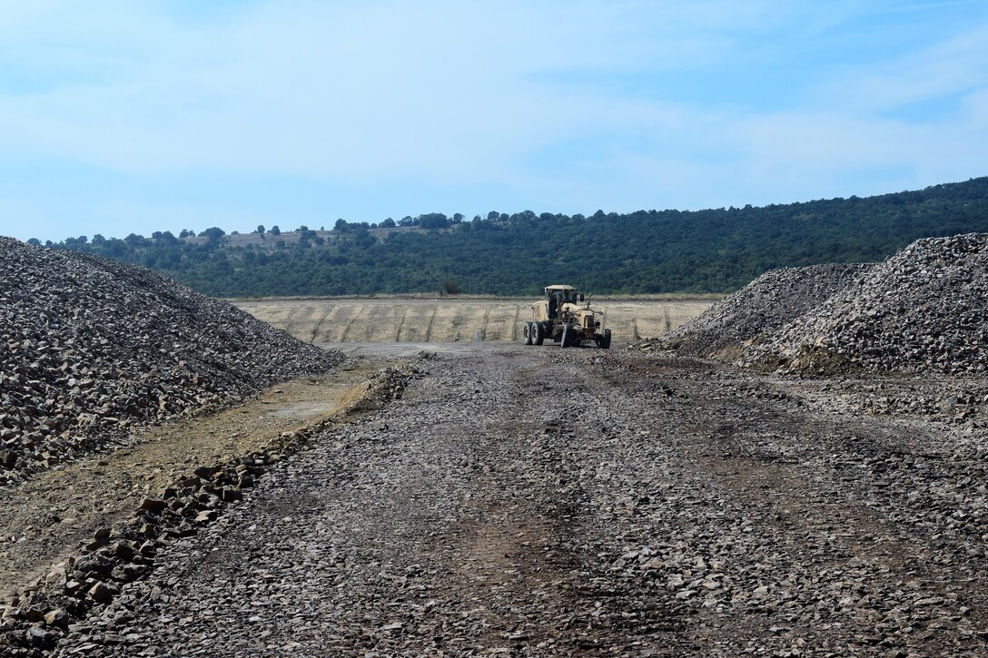 Soldiers with the 194th Engineer Brigade, Tennessee Army National Guard work with Airmen from the 118th Mission Support Group to finish construction of an ammunition holding area during Operation Resolute Castle on August 20, 2016 at Novo Selo Training Area, Bulgaria.  Operation Resolute Castle, a wide-scale military construction operation through Eastern Europe, spans across Estonia, Hungary, Romania, and Bulgaria, and involves units from the U.S. Army, U.S. Army Reserve, Tennessee Army and Air National Guard, Mississippi National Guard, and Alabama Army National Guard.  (U.S. Army Photo by 1st Lt. Matthew Gilbert, 194th Engineer Brigade, Tennessee Army National Guard)