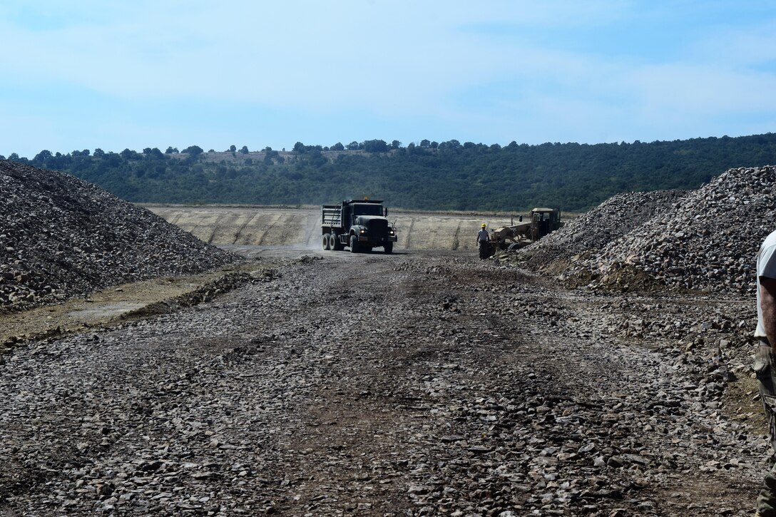 Soldiers with the 194th Engineer Brigade, Tennessee Army National Guard work with Airmen from the 118th Mission Support Group to finish construction of an ammunition holding area during Operation Resolute Castle on August 20, 2016 at Novo Selo Training Area, Bulgaria.  Operation Resolute Castle, a wide-scale military construction operation through Eastern Europe, spans across Estonia, Hungary, Romania, and Bulgaria, and involves units from the U.S. Army, U.S. Army Reserve, Tennessee Army and Air National Guard, Mississippi National Guard, and Alabama Army National Guard.  (U.S. Army Photo by 1st Lt. Matthew Gilbert, 194th Engineer Brigade, Tennessee Army National Guard)