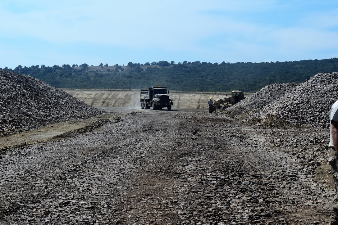 Soldiers with the 194th Engineer Brigade, Tennessee Army National Guard work with Airmen from the 118th Mission Support Group to finish construction of an ammunition holding area during Operation Resolute Castle on August 20, 2016 at Novo Selo Training Area, Bulgaria.  Operation Resolute Castle, a wide-scale military construction operation through Eastern Europe, spans across Estonia, Hungary, Romania, and Bulgaria, and involves units from the U.S. Army, U.S. Army Reserve, Tennessee Army and Air National Guard, Mississippi National Guard, and Alabama Army National Guard.  (U.S. Army Photo by 1st Lt. Matthew Gilbert, 194th Engineer Brigade, Tennessee Army National Guard)