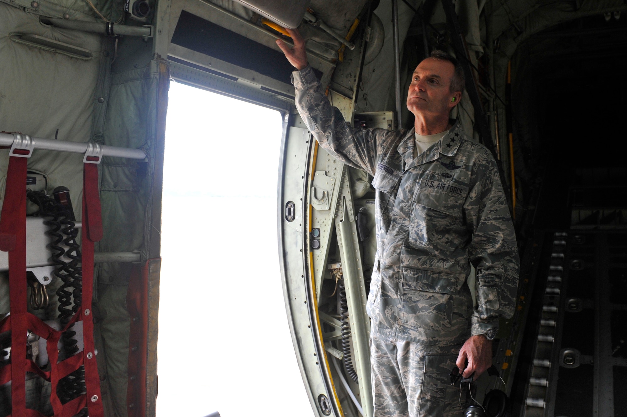 Lt. Gen. Darryl Roberson, commander of Air Education and Training Command, tours the inside of a C-130J Super Hercules Aug. 22, 2016, at Little Rock Air Force Base, Ark. During his tour, Roberson spoke to crew chiefs who recently received a Black Letter Initial which is earned when there are zero discrepancies during a flight. (U.S. Air Force photo by Staff Sgt. Regina Edwards)