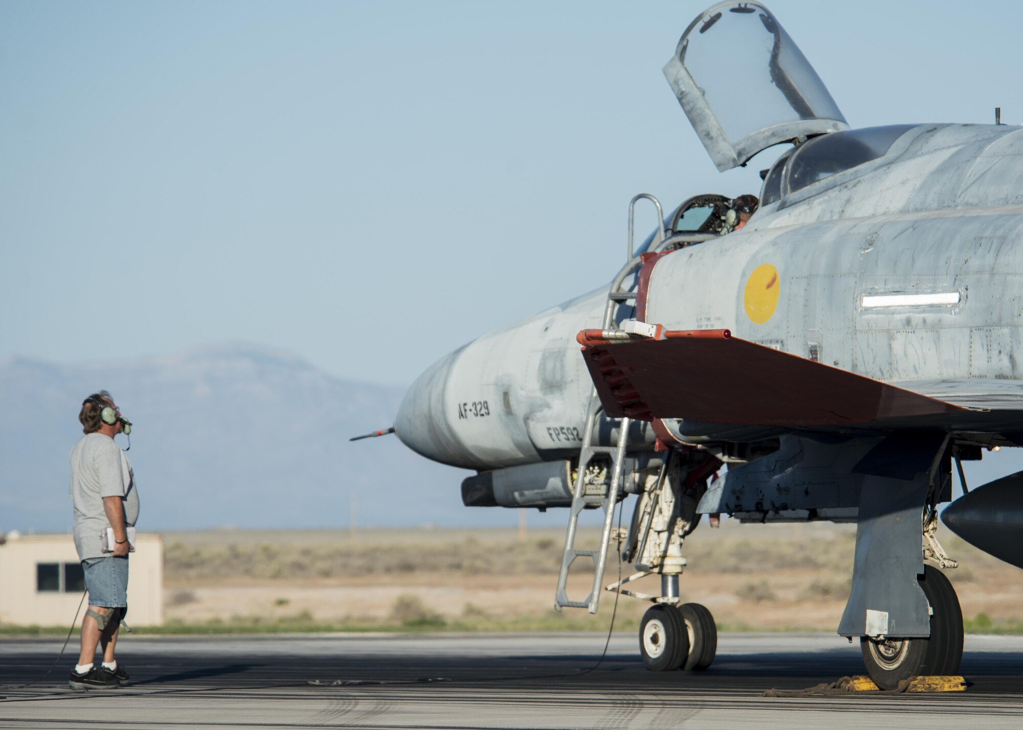 QF-4 Phantom maintainers go through pre-flight inspections before the aircraft’s final unmanned mission at Holloman Air Force Base, N.M. on Aug. 17. The QF-4 mission will continue flying manned missions until the official end of the QF-4 program in December 2016. (U.S. Air Force photo by Airman 1st Class Randahl J. Jenson)