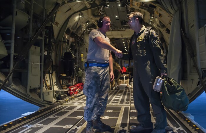 Crew Chiefs assigned to the 71st Rescue Squadron, Moody Air Force Base, Georgia, sit on the back of a HC-130J Combat King II and await aircrew’s arrival during Red Flag 16-4 at Nellis Air Force Base, Nev., Aug. 25, 2016. Aircraft and personnel deploy to Nellis AFB for Red Flag under the Air Expeditionary Force concept and make up the exercise’s “blue” forces. (U.S. Air Force photo by Airman 1st Class Kevin Tanenbaum/Released)
