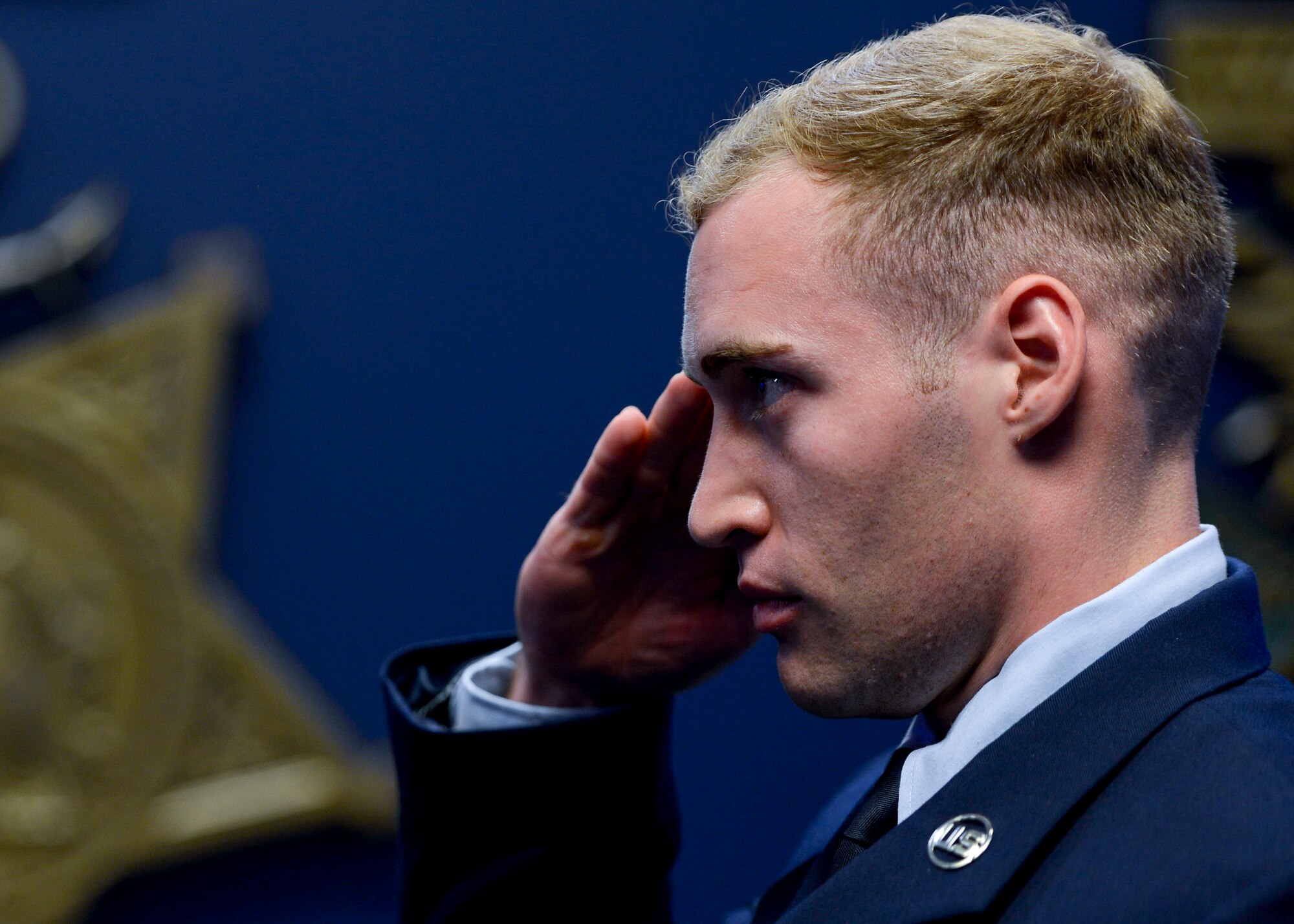 A Special Tactics Airman salutes the presiding general officer during the Air Force's Annual Award ceremony for Special Tactics and others in the Pentagon's Hall of Heroes Aug. 25, 2016, in Washington, D.C. Special Tactics Airmen are the Air Force’s ground special operations force, enabling airpower success in any environment.  (U.S. Air Force photo by Tech. Sgt. Anthony Nelson Jr)