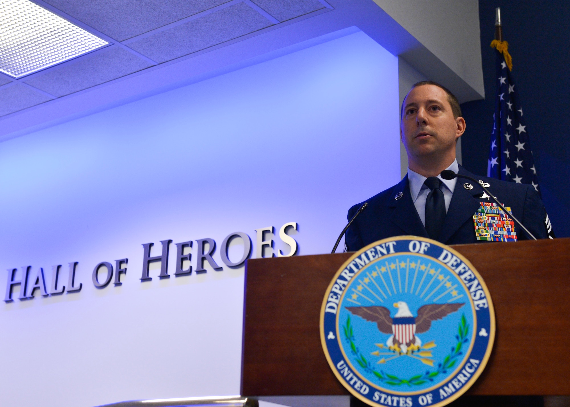 Chief Master Sgt. Jeffrey George, master of ceremonies speaks during the Air Force's Annual Award ceremony for Special Tactics and others in the Pentagon's Hall of Heroes Aug. 25, 2016, in Washington, D.C. Special Tactic Airmen provide a full-spectrum, air-focused special operations capability to the combatant commander in order to ensure airpower success.  (U.S. Air Force photo by Tech. Sgt. Anthony Nelson Jr)