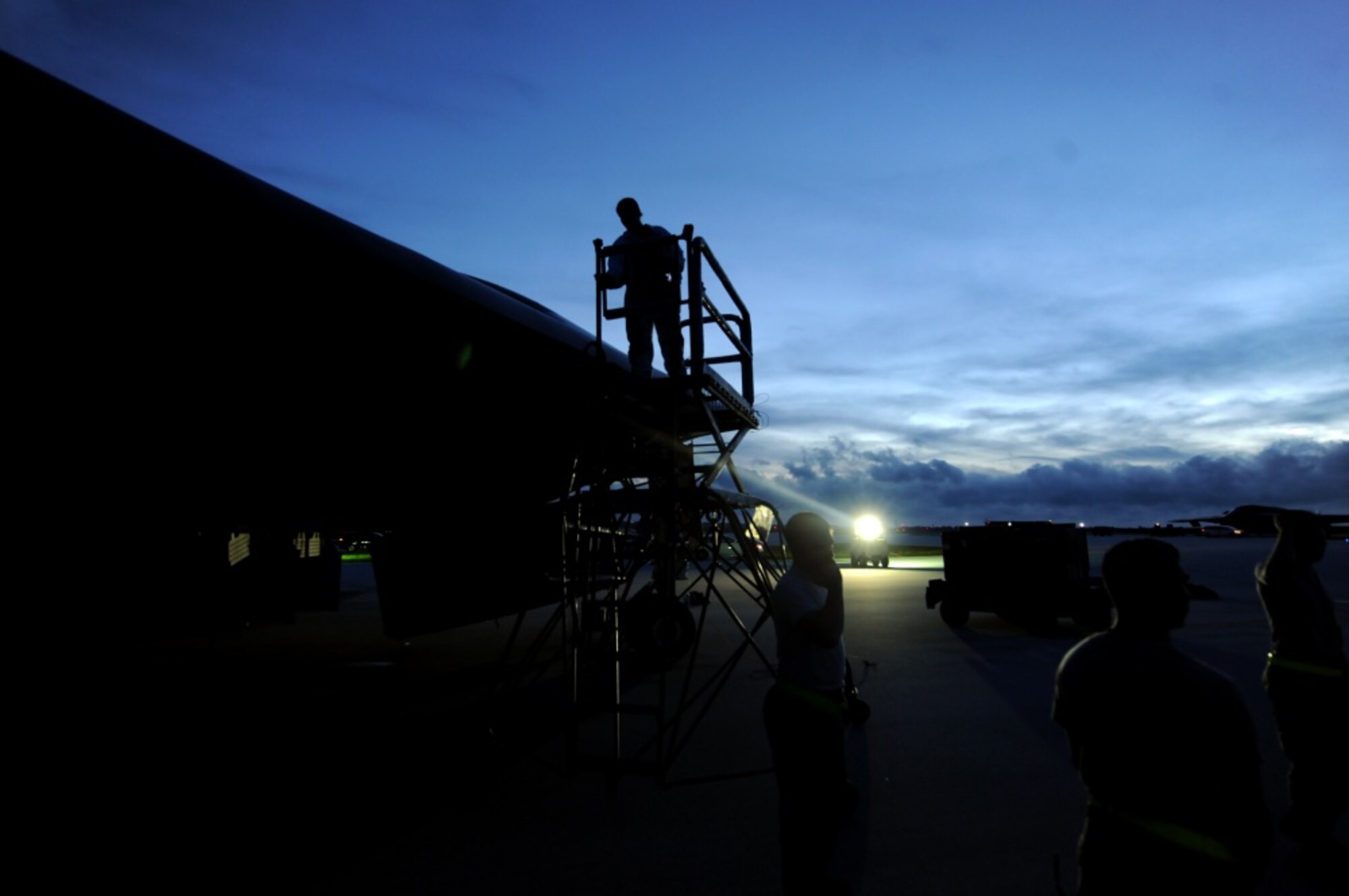 Airmen assigned to the 509th Aircraft Maintenance Squadron deployed from Whiteman Air Force Base, Mo., perform maintenance on a B-2 Spirit Aug. 24, 2016 at Andersen Air Force Base, Guam. U.S. Strategic Command forces operate 24-hours-a-day, seven-days-a-week detecting and deterring strategic attack against the U.S. and our allies. (U.S. Air Force photo by Senior Airman Jovan Banks)