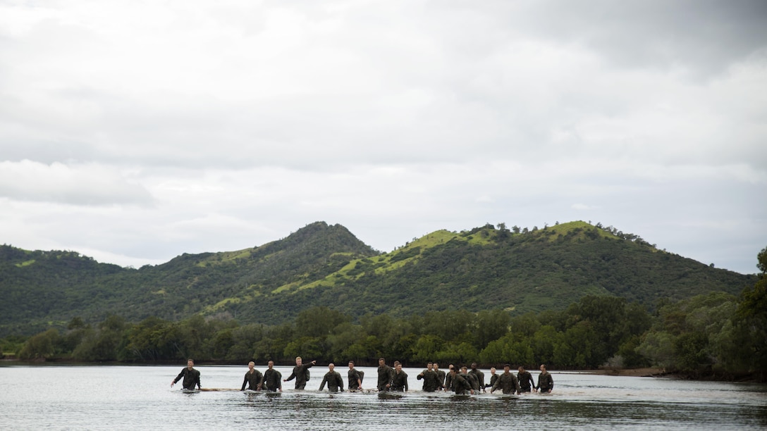 Marines with Marine Rotational Force – Darwin and French Armed Forces soldiers with 92nd Infantry Regiment cross a river during a French Armed Forces Nautical Commando Course in Noumea, New Caledonia, August 22, 2016. The course is a part of Exercise AmeriCal 16, a bilateral training exercise designed to enhance mutual combat capabilities and improve relations between the U.S. Marine Corps and the French Armed Forces.