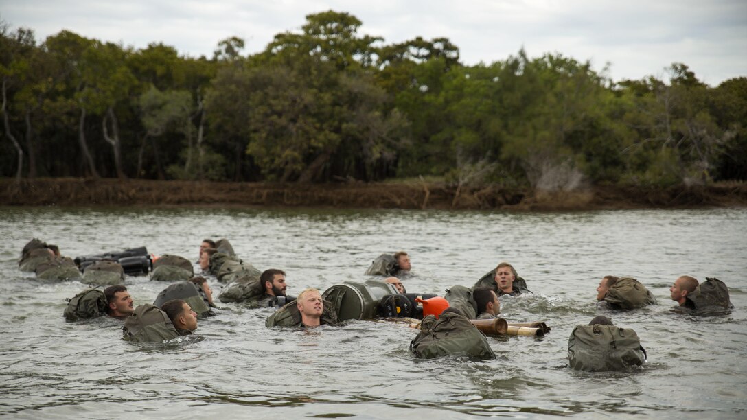 Marines with Marine Rotational Force – Darwin and French Armed Forces soldiers with 92nd Infantry Regiment cross a river during a French Armed Forces Nautical Commando Course in Noumea, New Caledonia, August 22, 2016. The course is a part of Exercise AmeriCal 16, a bilateral training exercise designed to enhance mutual combat capabilities and improve relations between the U.S. Marine Corps and the French Armed Forces.