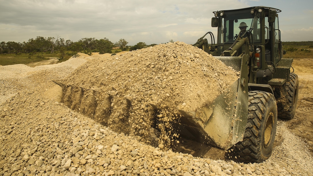 A U.S. Marine with Marine Wing Support Detachment 31, in support of Special Purpose Marine Air-Ground Task Force - Southern Command, uses a 624KR TRAM to gather dirt at the Hattieville Range Complex in Hattieville, Belize, Aug. 24, 2016. Over the next several months, Marines from MWSD-31 will be working on several engineer projects in Belize, which will help to increase partner nation capacity and strengthen regional defense and security cooperation. 