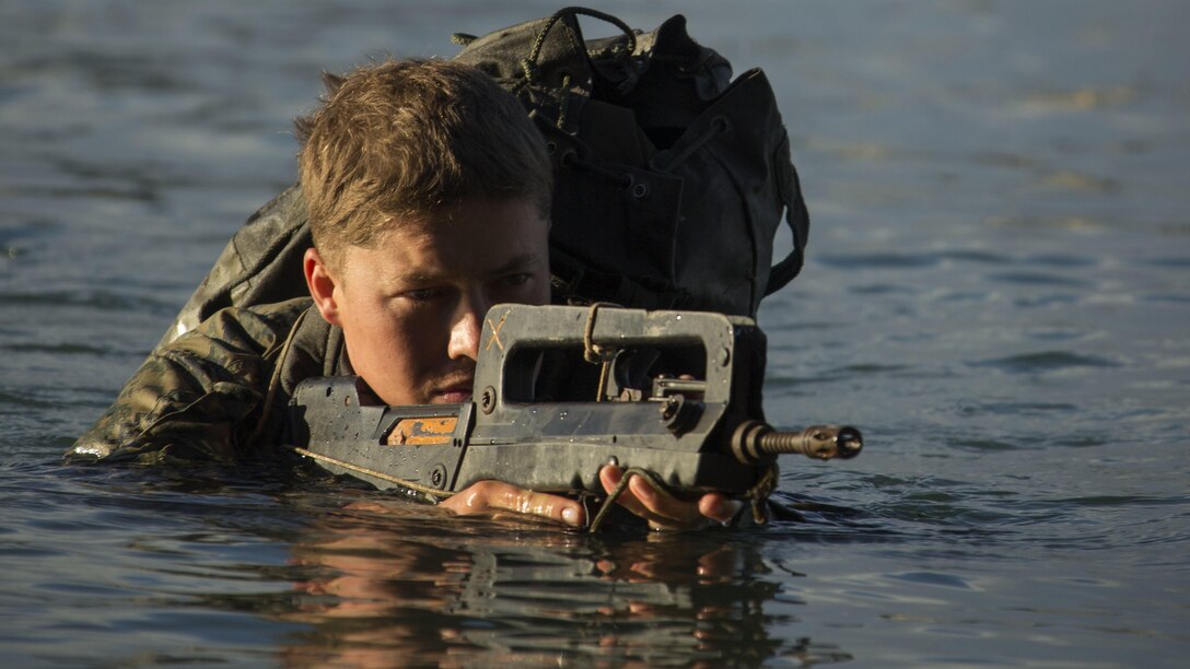 Sgt. Donald J. Conde III, a rifleman, conducts a tactical shore insertion off the coast of Noumea, New Caledonia, August 18, 2016. The Marines are in New Caledonia participating in a French Nautical Commando Course which consists of various water survival and tactical training. The course is a part of Exercise AmeriCal 16, a bilateral training exercise designed to enhance mutual combat capabilities and improve relations between the U.S. Marine Corps and the French Armed Forces. Conde III from Temecula, California, is with Marine Rotational Force - Darwin.