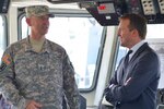 Chief Warrant 4 William Sherman, 73rd Transportation Company large tug vessel master for U.S. Army Vessel Maj. Gen. Winfield Scott (LT-805), briefs Secretary of the Army Eric Fanning about the vessel's capabilities at Joint Base Langley-Eustis, Virginia, Aug. 25, 2016. The Winfield Scott is a large ocean-going vessel capable of deploying anywhere in the world from its current location.