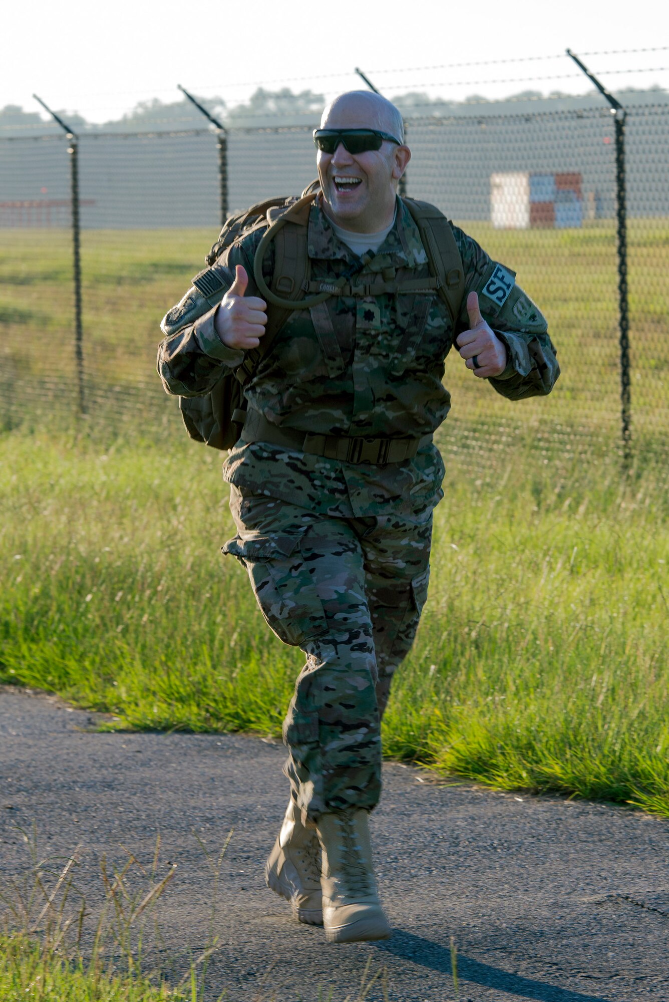 U.S. Air Force Lt. Col. Jeffrey Rowsey, 93d Air Ground Operations Wing chief of safety, gives a ‘thumbs up’ during a 4-mile ruck march, Aug. 26, 2016, at Moody Air Force Base, Ga. The 93d AGOW consists of three groups with more than approximately 2,800 battlefield Airmen at 20 locations throughout the continental United States. (U.S. Air Force photo by Airman 1st Class Greg Nash)