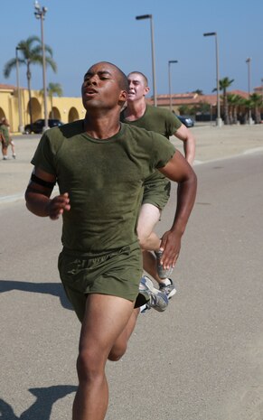 Recruits from Fox Company, 2nd Recruit Training Battalion, conduct a three-mile run during an inventory physical fitness test at Marine Corps Recruit Depot San Diego, Aug. 29. The run was the second portion of the event, after the pull-ups and before conducting crunches. Annually, more than 17,000 males recruited from the Western Recruiting Region are trained at MCRD San Diego. Fox Company is scheduled to graduate Sept. 23.