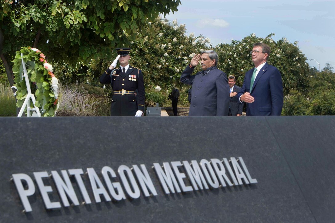 Defense Secretary Ash Carter, right, and Indian Defense Minister Manohar Parrikar render honors after laying a wreath at the 9/11 Pentagon Memorial, Aug. 29, 2016. The two leaders also held a press conference after meeting to discuss matters of mutual interest. DoD photo by Navy Petty Officer 1st Class Tim D. Godbee