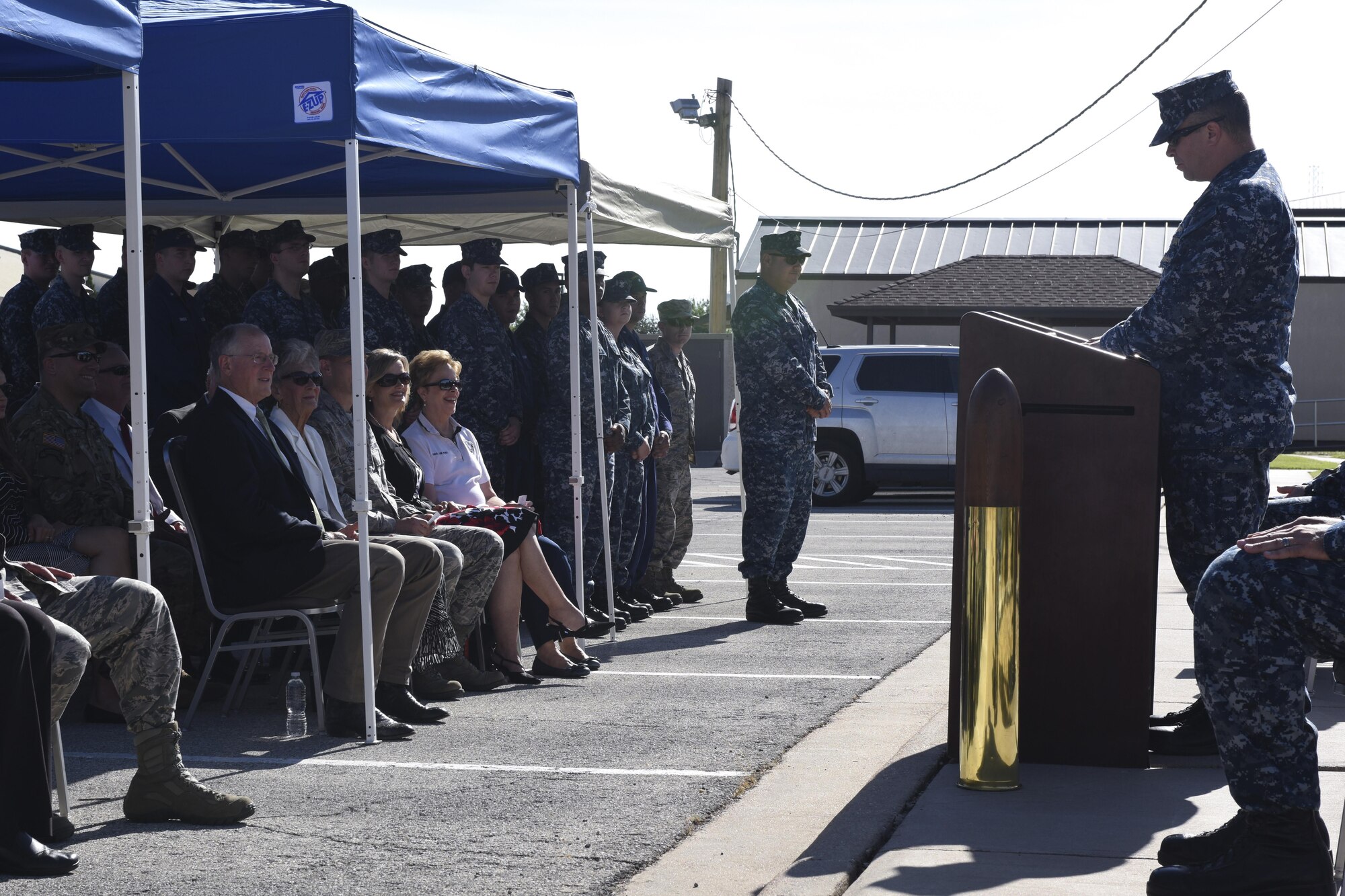 U.S. Navy Lt. Cmdr. Christopher Allen, Center for Information Dominance Detachment Officer in Charge, gives a speech about Navy and Goodfellow history at the Liberty Memorial on Goodfellow Air Force Base, Texas, Aug. 26. The speech paid tribute to the 50 yearlong relationship between the detachment and Goodfellow. (U.S. Air Force photo by Airman 1st Class Chase Sousa/Released)